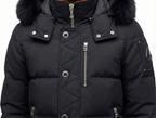 Black winter jacket with fur-lined hood on a white background