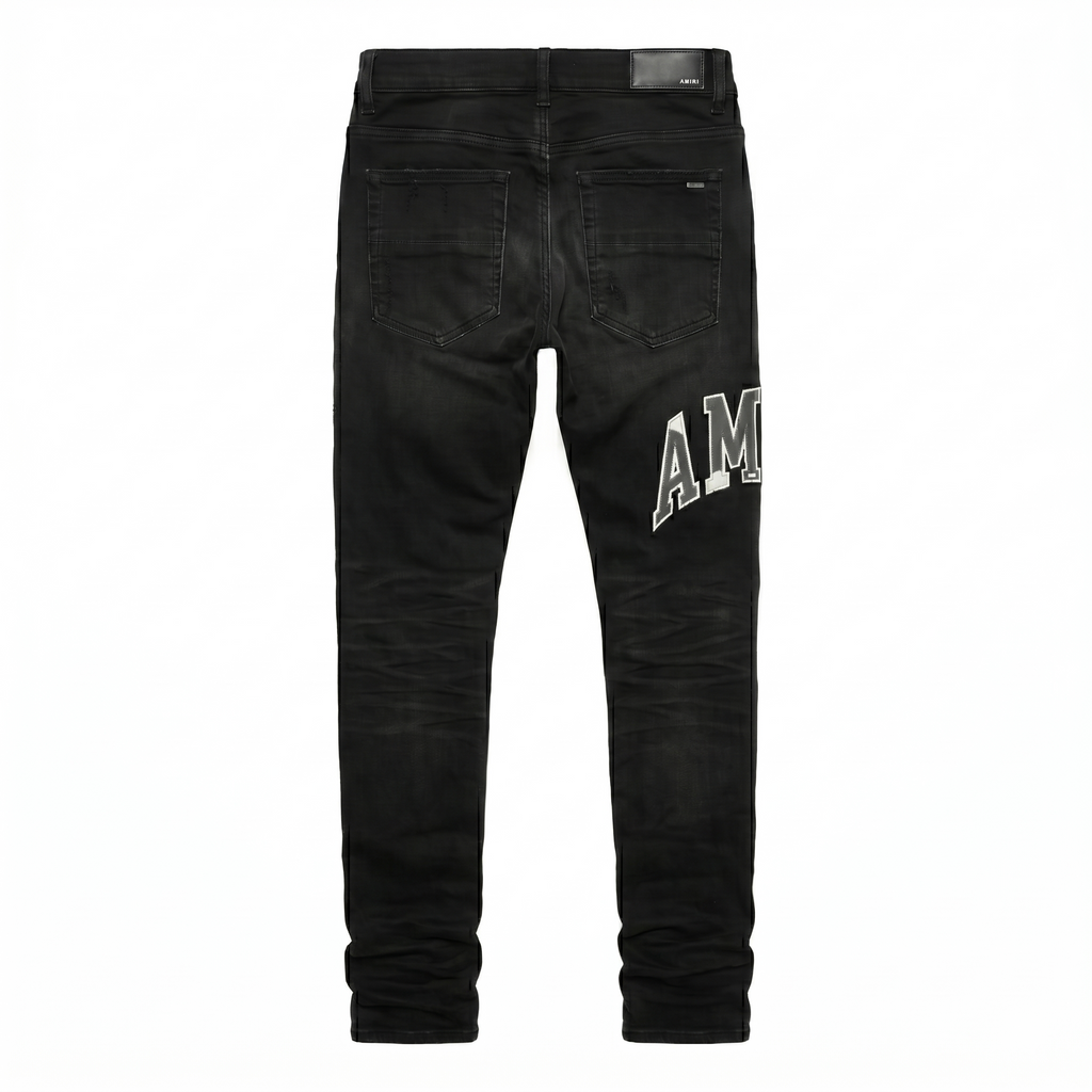Amiri Varsity Logo Repair Jeans — Vintage Black