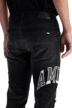 Amiri Varsity Logo Repair Jeans — Vintage Black