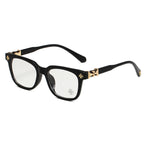 Chrome Hearts Cox Ucker 2273 glasses in black acetate with gold cross hardware, front angle