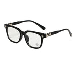 Chrome Hearts Cox Ucker 2273 glasses in black acetate with silver cross hardware, front angle