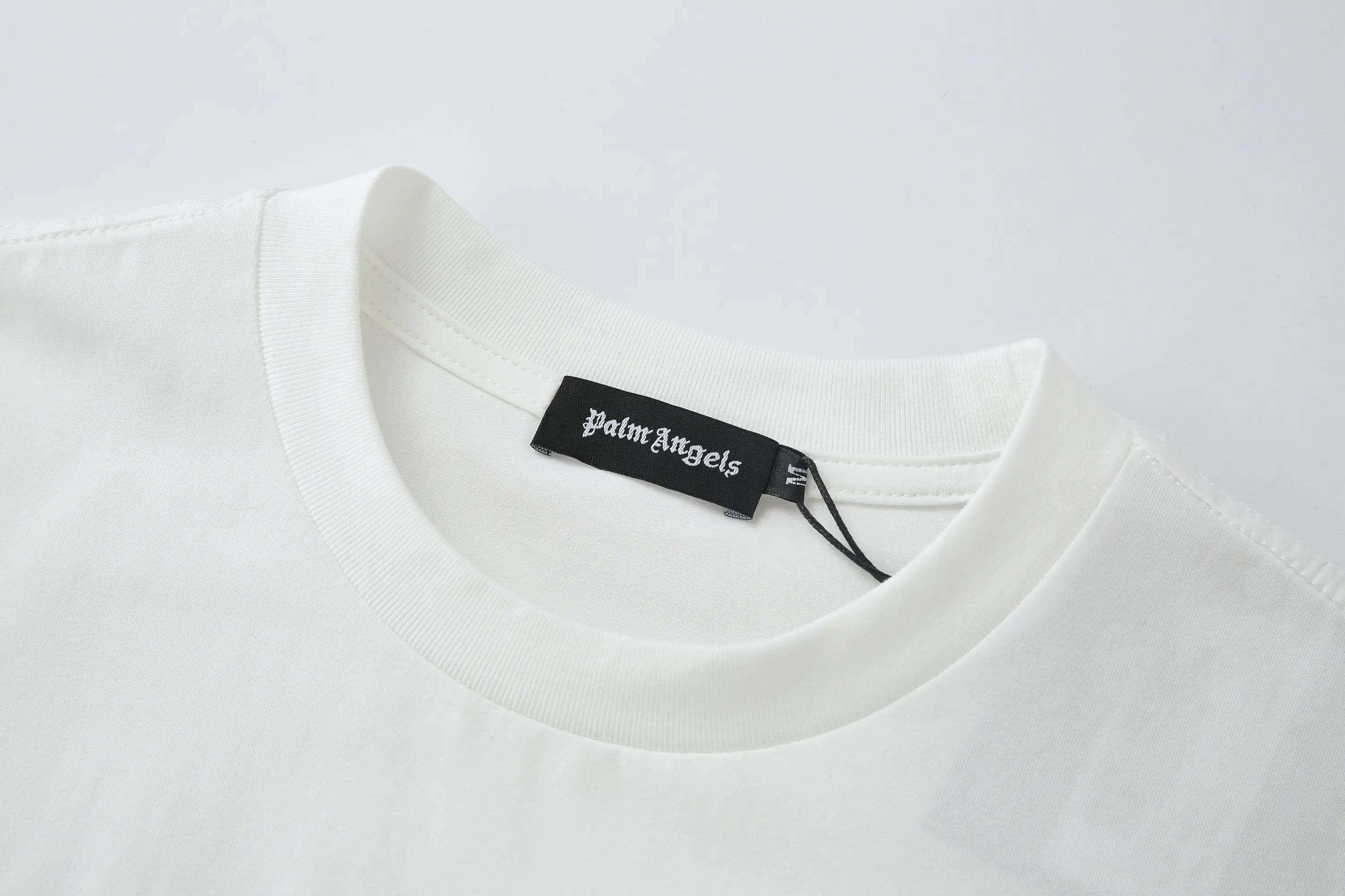 Palm Angels "Ignore You" Skull Graphic T-Shirt - White